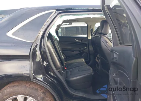 2021 Ford Edge Titanium z USA, uszkodzony, nr VIN 2FMPK4K93MBA27270